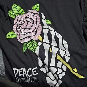 Peace Graphic Tee with Rose and Skeleton Design